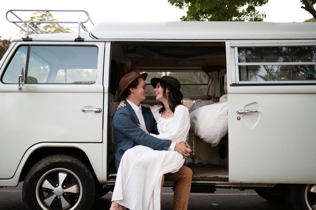 Two people in a campervan, close.